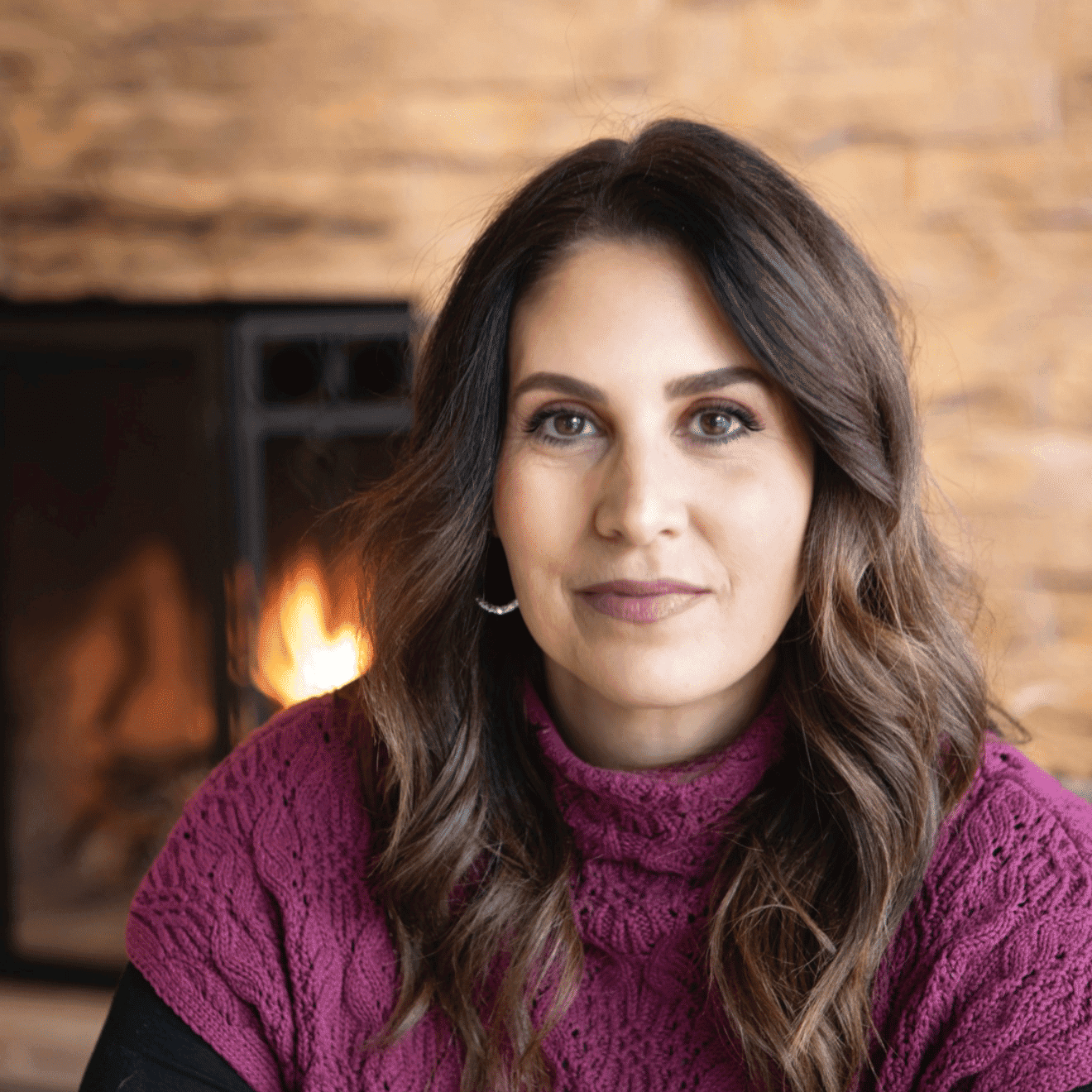 Portrait of Alexis Stimmel, a professional stylist at Studio Raw Elite, showcasing their expertise and style.