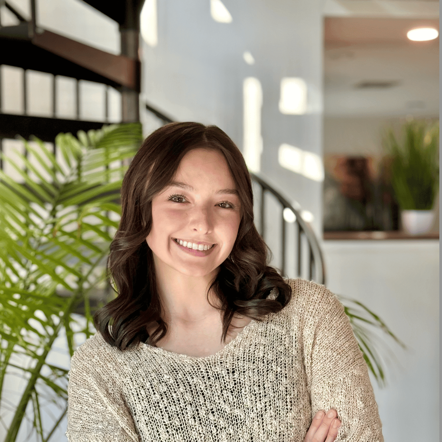 Portrait of Ava Weaver, a professional stylist at Studio Raw Elite, showcasing their expertise and style.